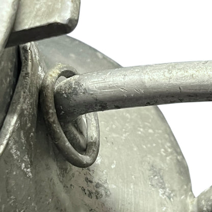 Close-up of a grey milk churn on a white background