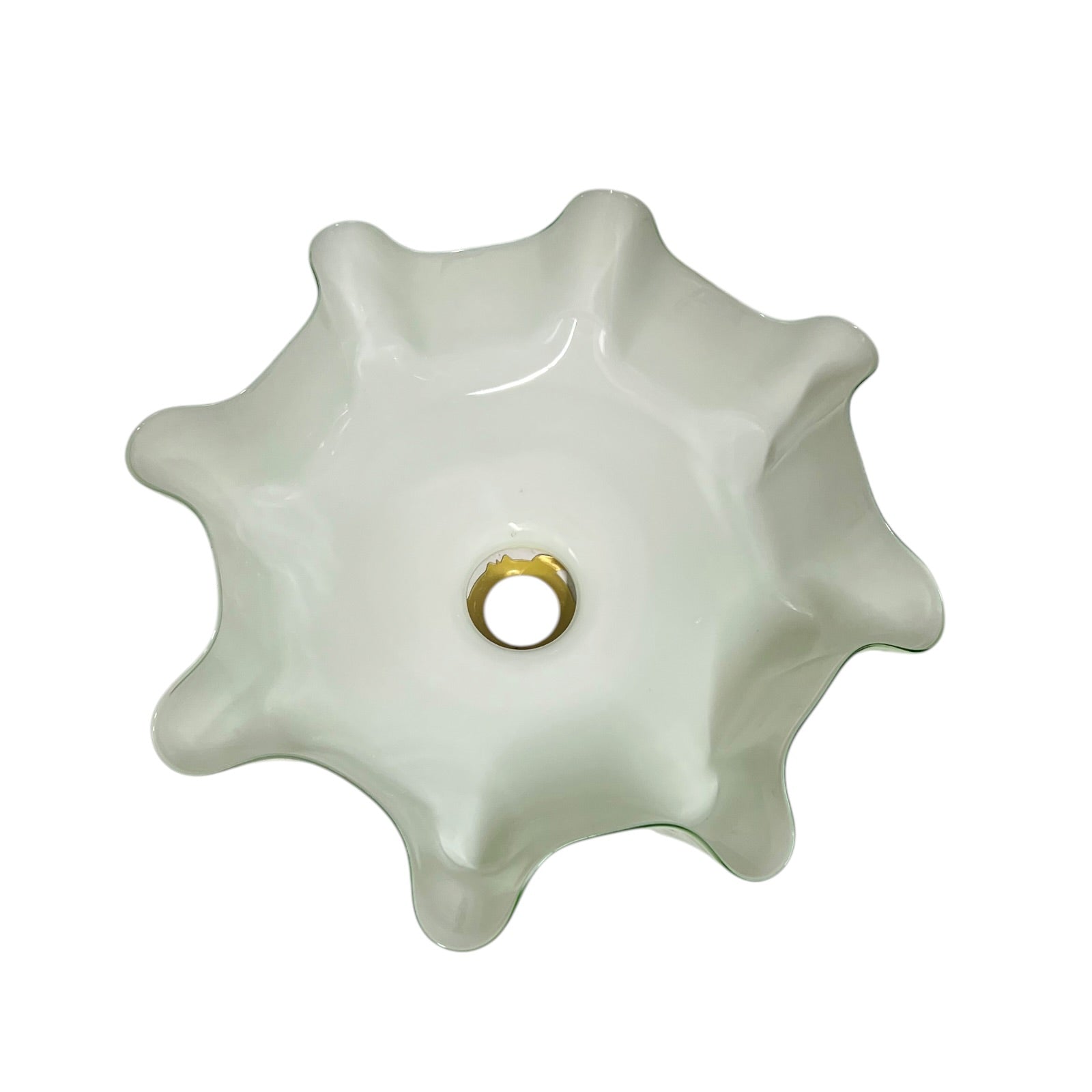 close up of the inside of a glass lampshade on a white background