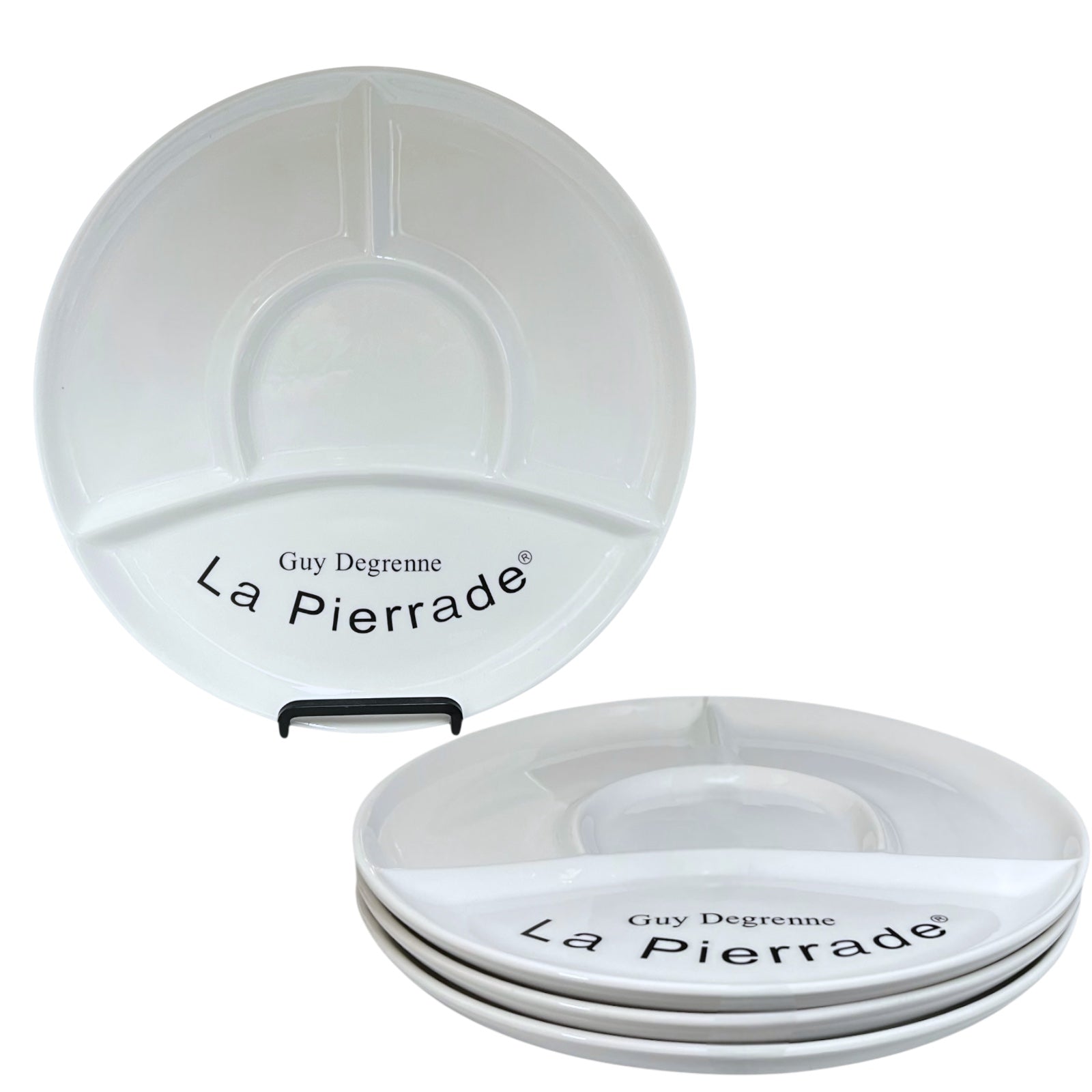 White ceramic dishes with 'La Pierrade' branding on a white background