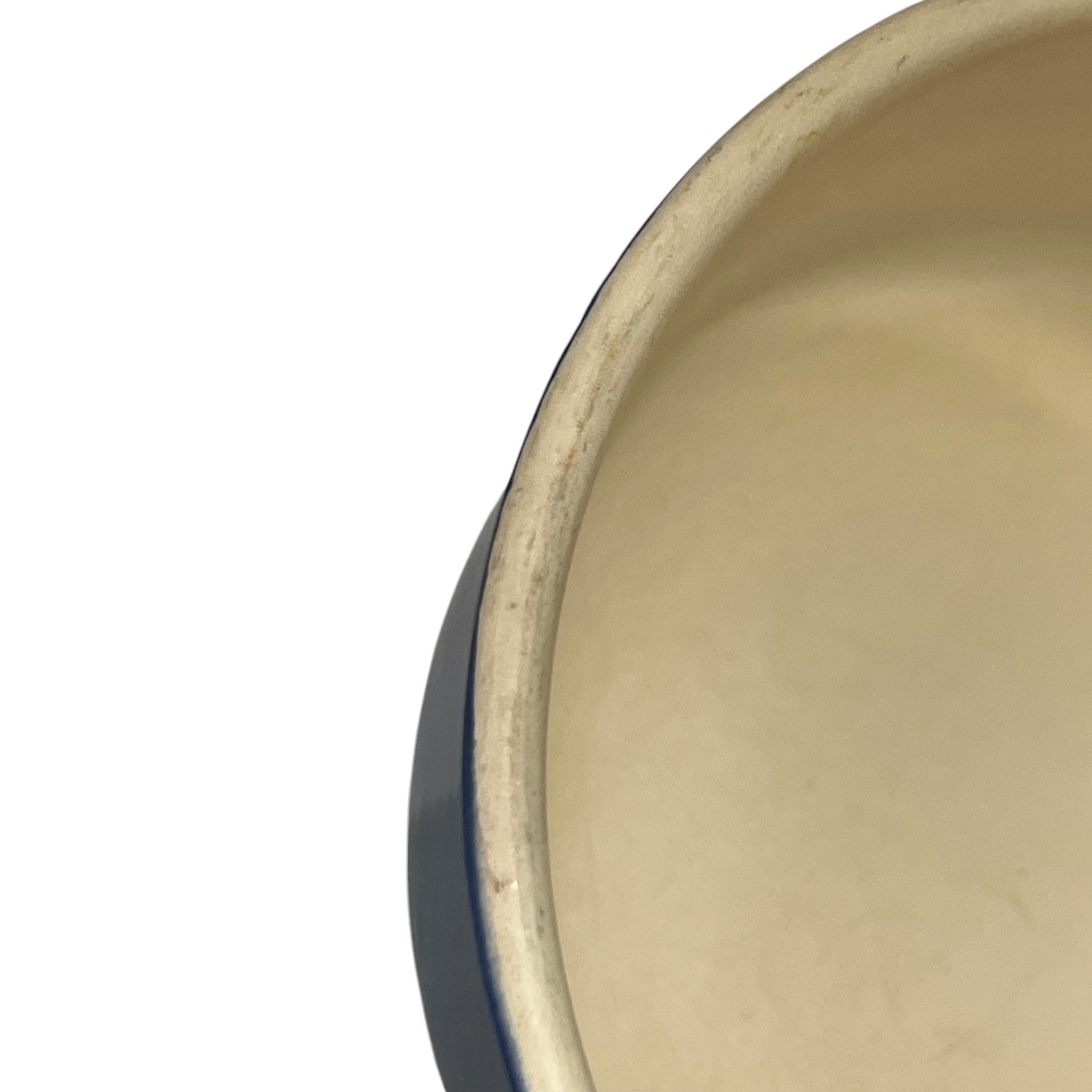 Close-up of a blue saucepan with a white background