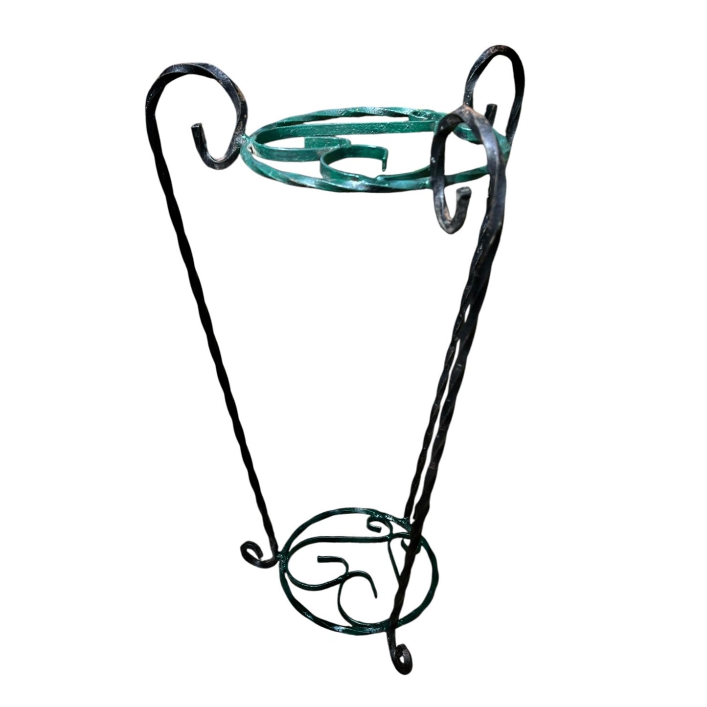 Green and black wrought iron jardinière scrolled plant stand on a white background