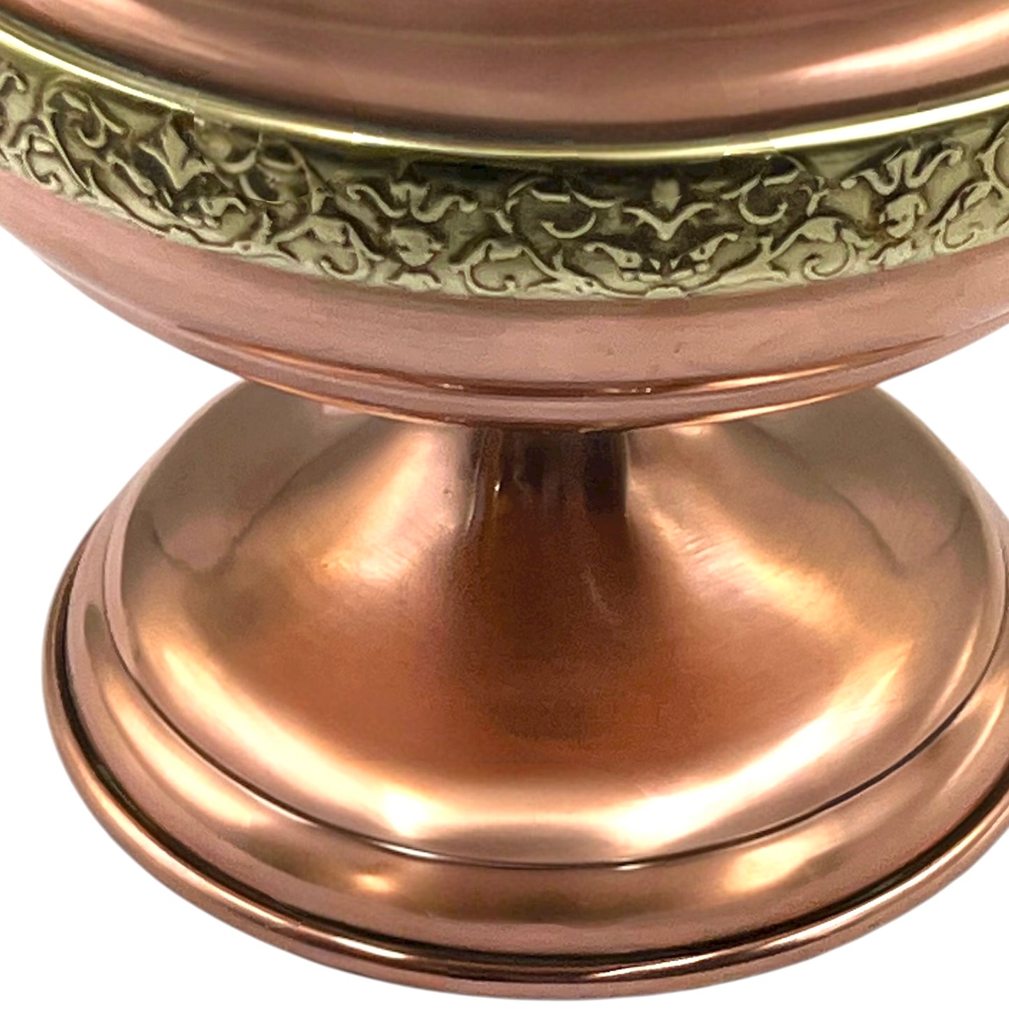 Copper lamp base with intricate engravings on a white background