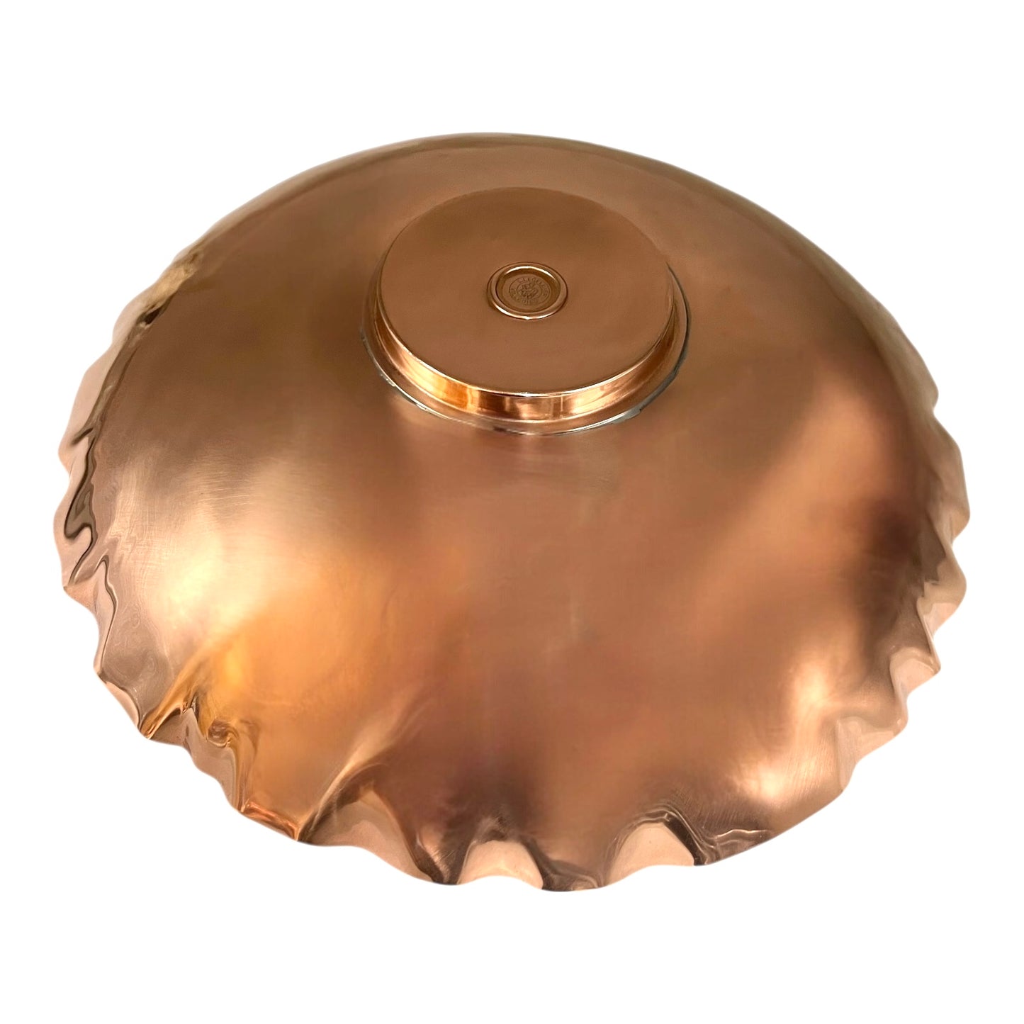 copper fruit bowl on a white background