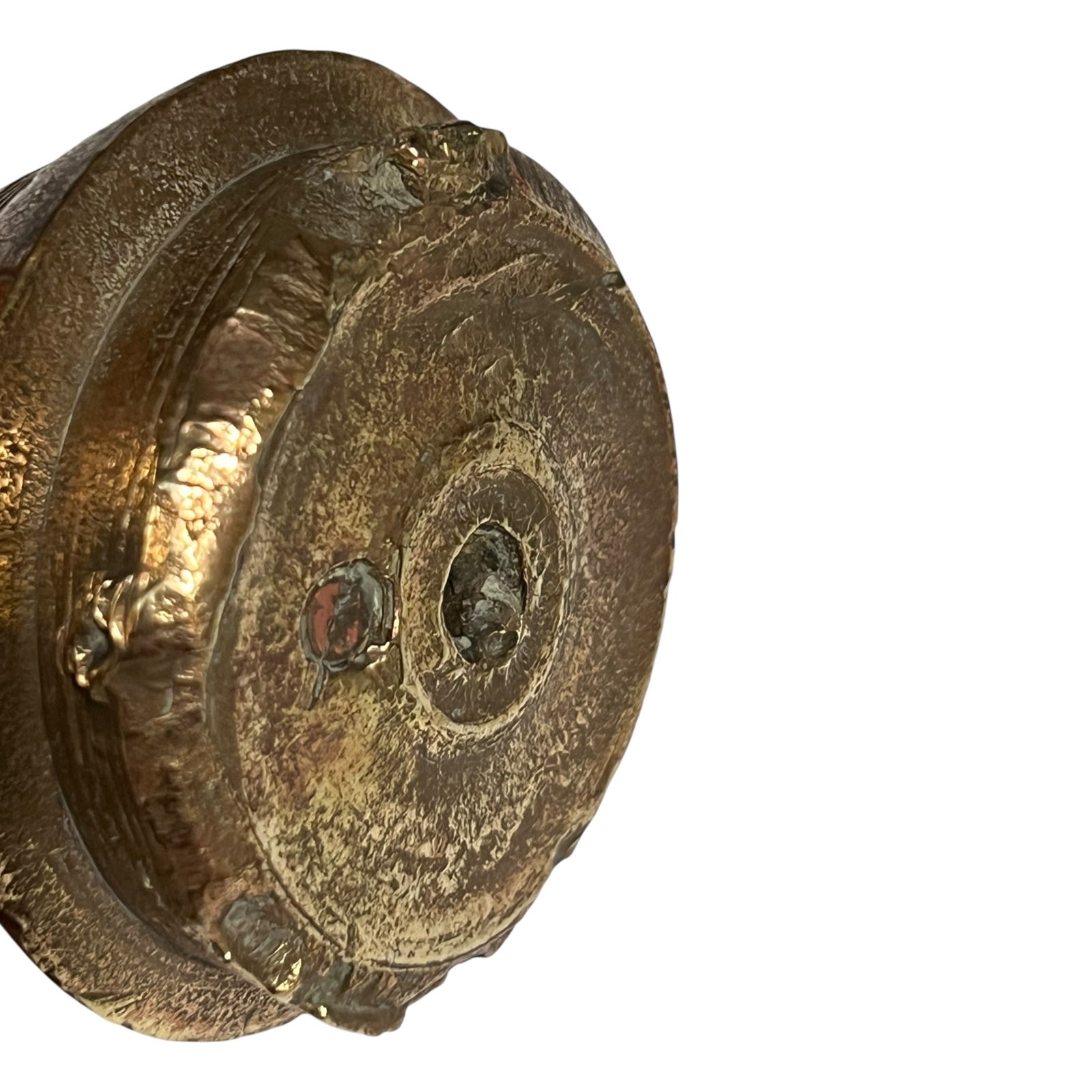 WW1 brass fuse paperweight on a white background 