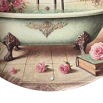 Vintage-style bathtub with decorative elements and pink roses on a tiled floor.