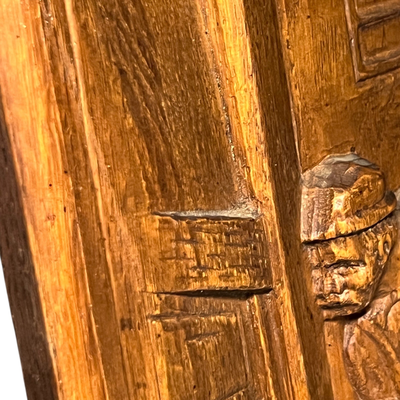 Close-up of a wooden door with intricate carvings