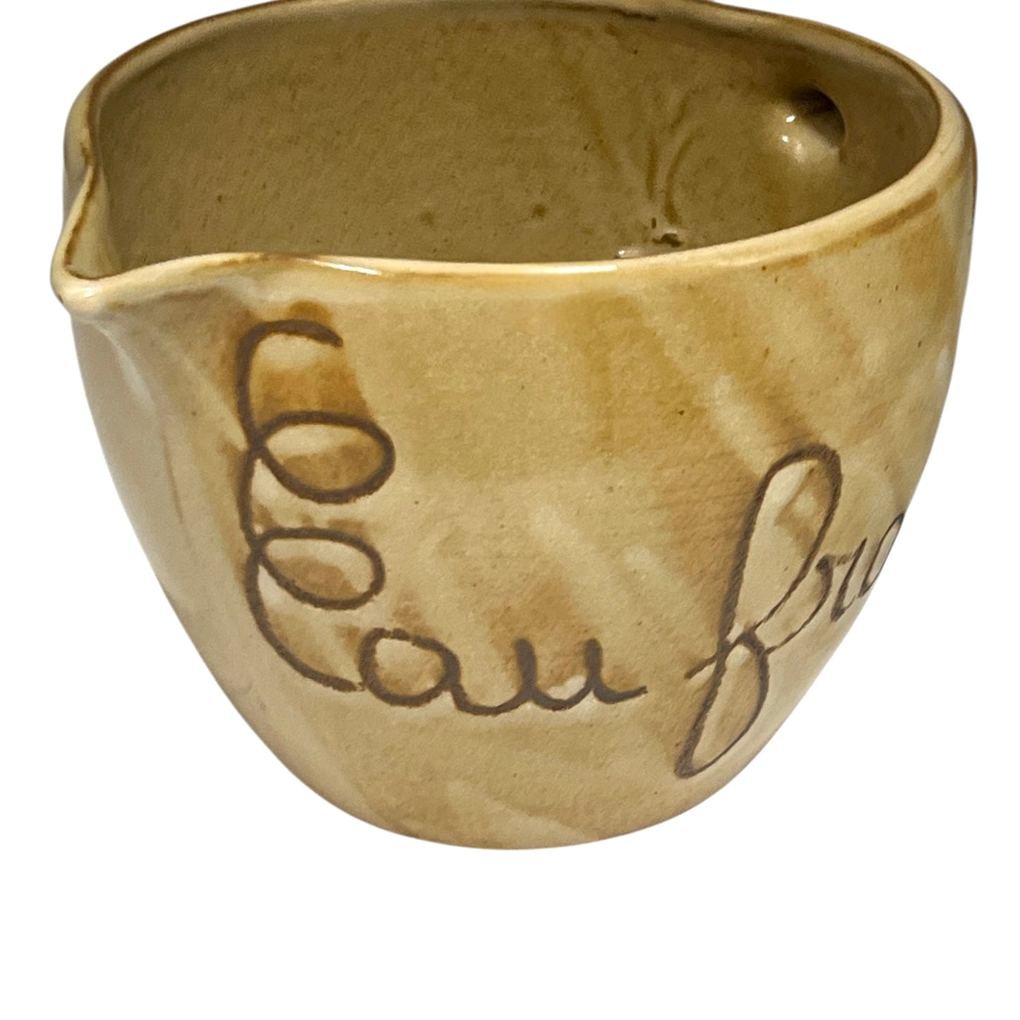 Ceramic pitcher with 'eau fraiche' text on a white background