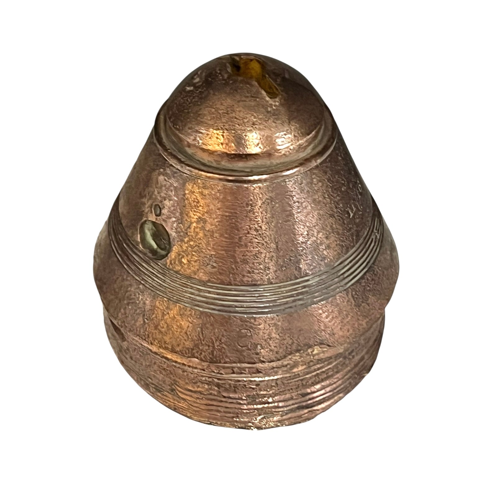 Brass metal cap fuse on a white background