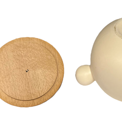 Wooden lid and beige container on a white background