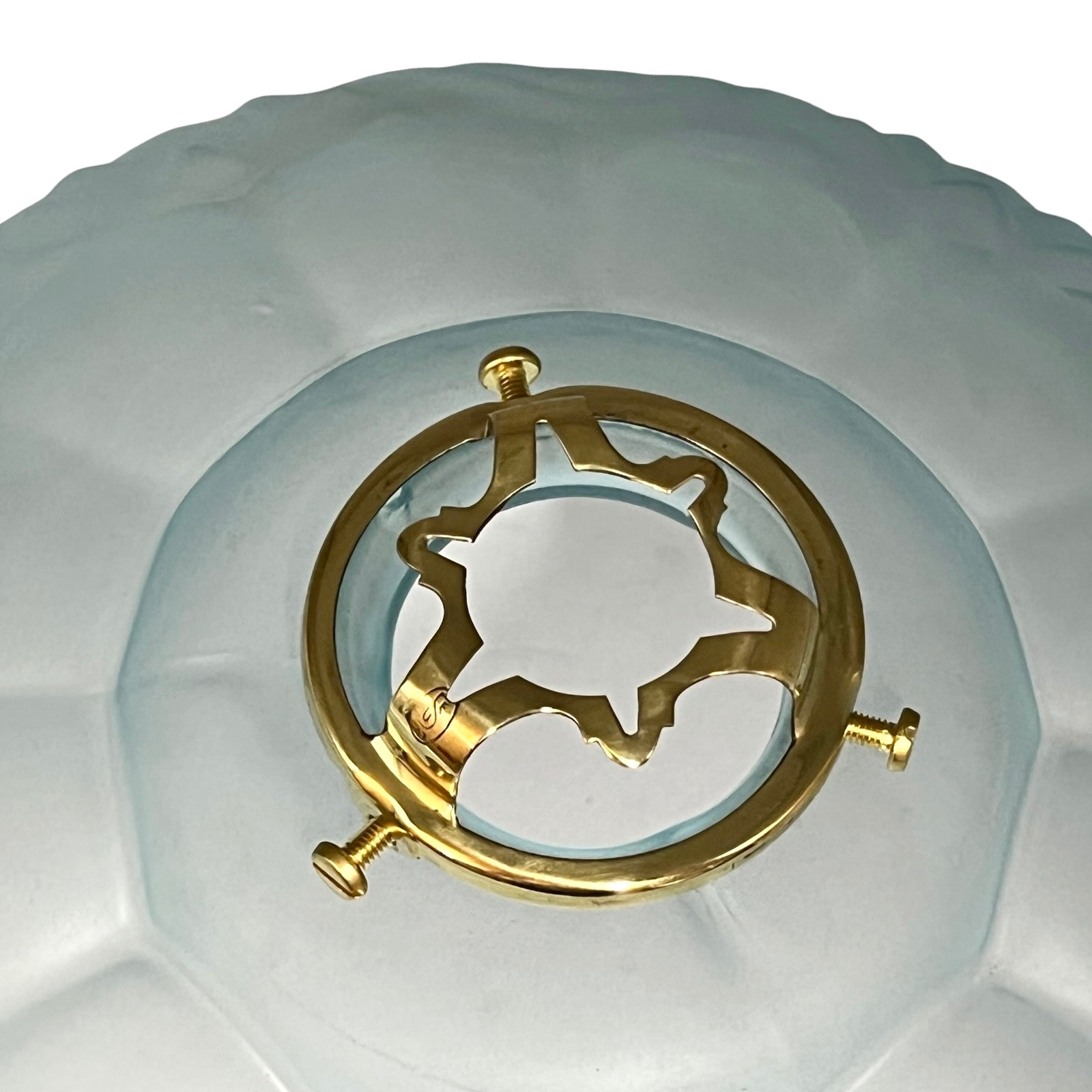 Close-up of the original brass gallery showing its distinctive vintage French design and fitting.