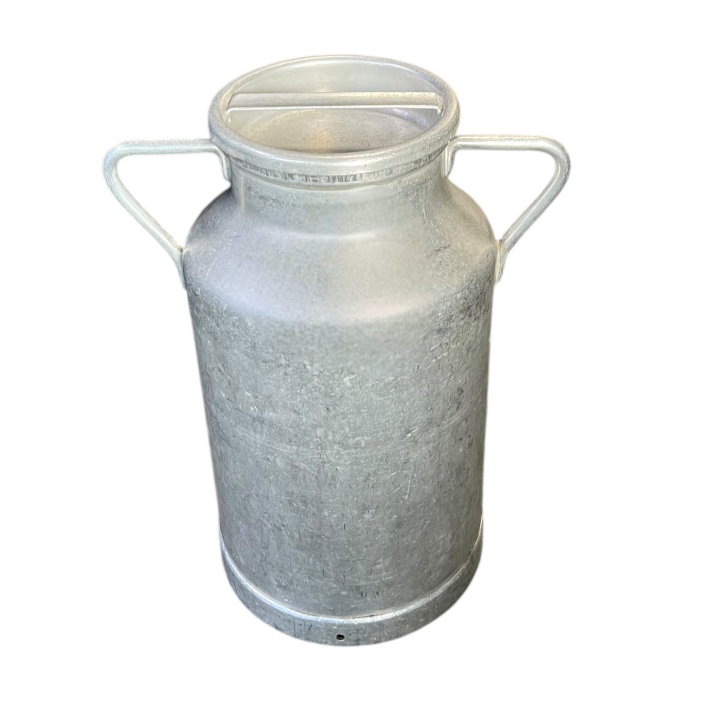 Metal milk churn on a white background