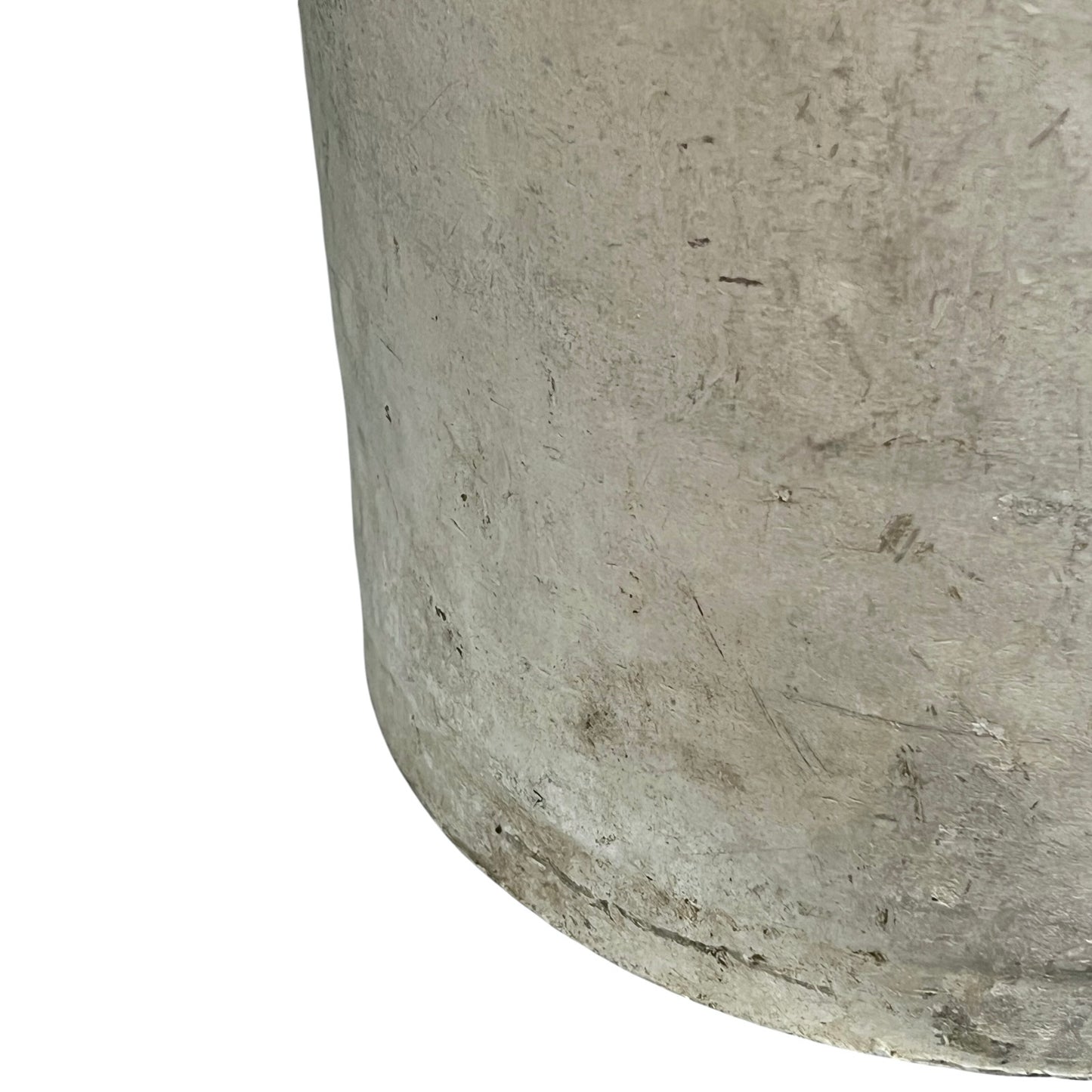 Close up of a vintage metal milk churn on a white background