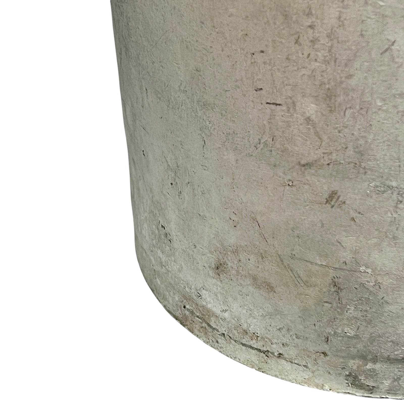Close up of a vintage metal milk churn on a white background