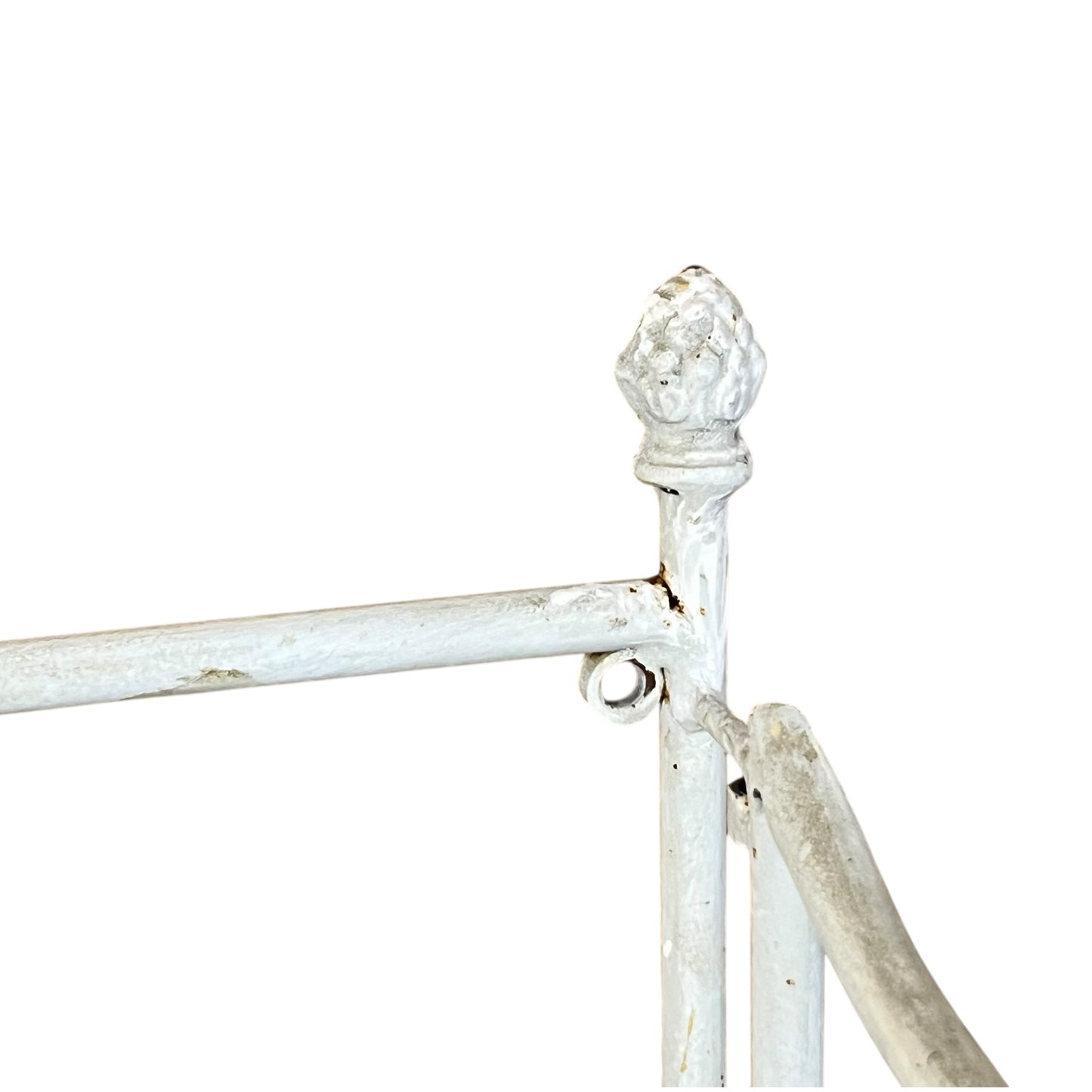 Close-up of a metal she with visible wear and tear on a white background