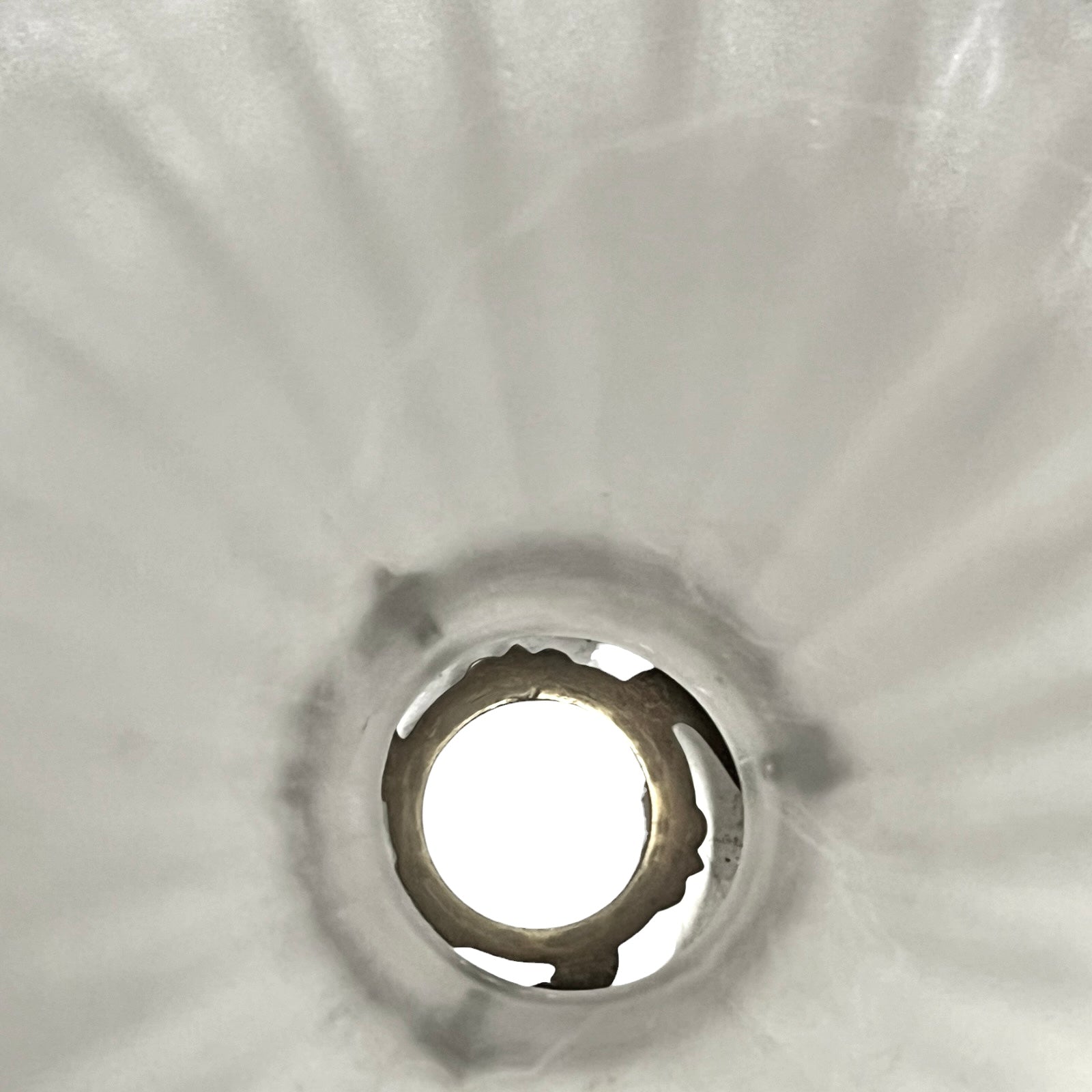 Close up of a vintage French glass lamp shade