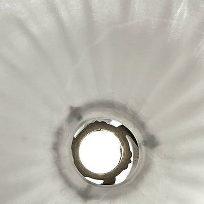 Close up of a vintage French glass lamp shade