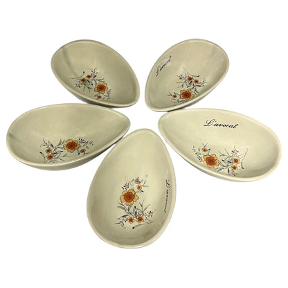 Set of five ceramic bowls with floral design and 'Lavocat' branding on a white background
