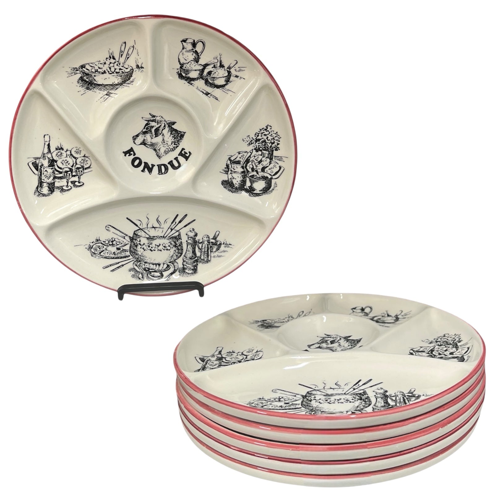 Set of ceramic plates with fondue-themed designs on a white background