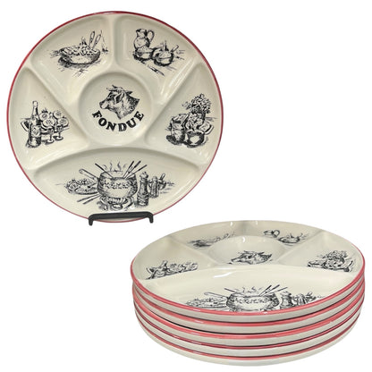 Set of ceramic plates with fondue-themed designs on a white background