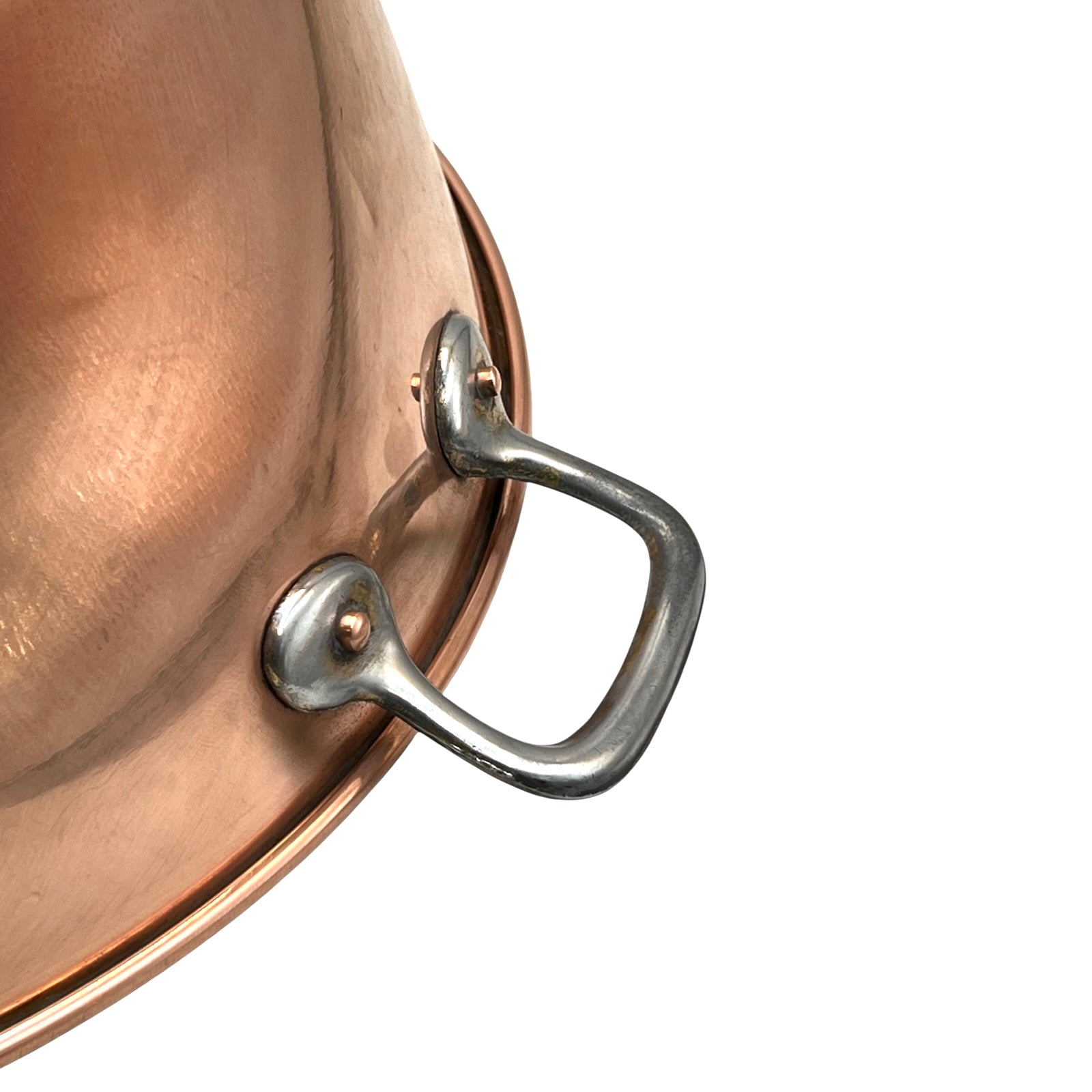 Close-up of a copper sink on a white background