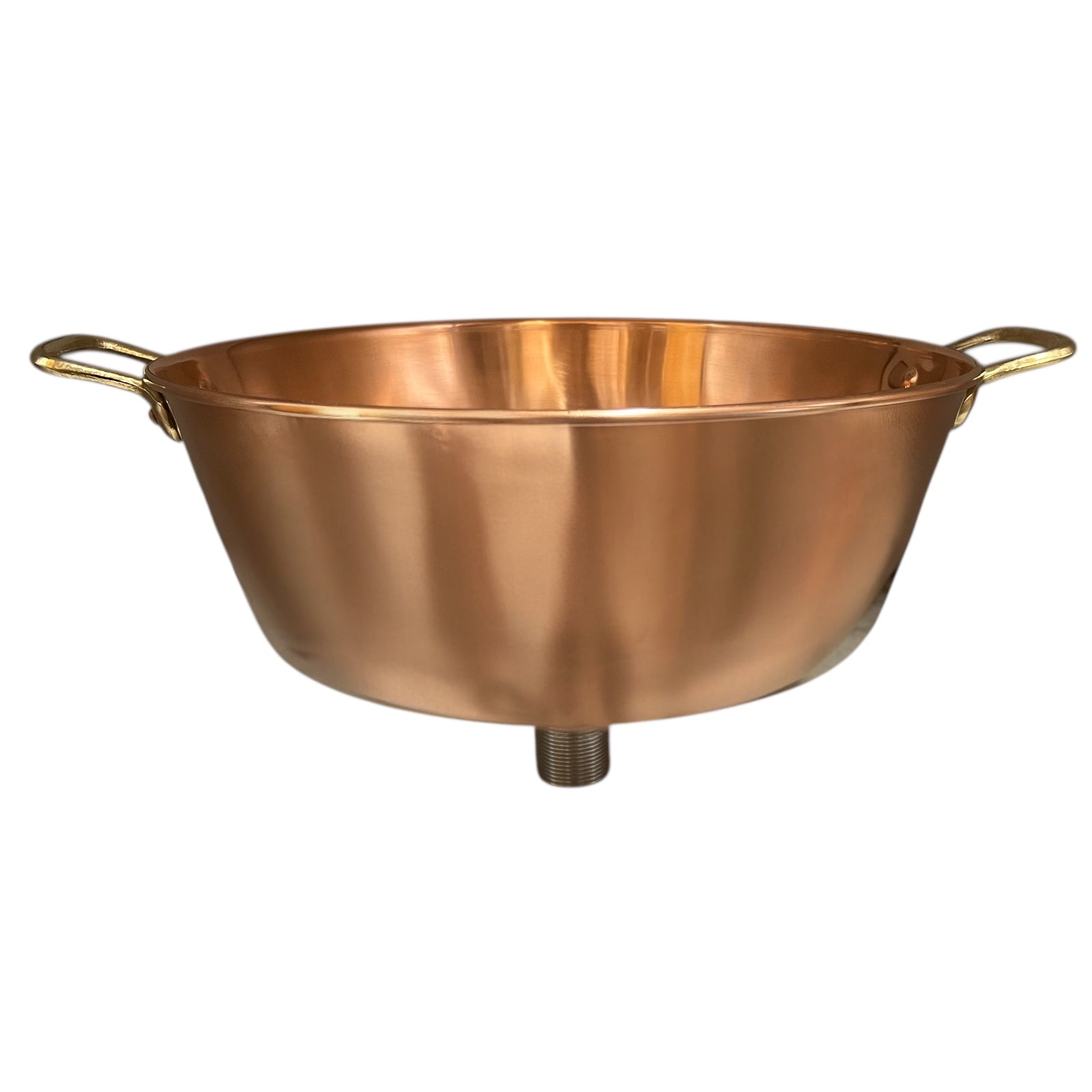 Copper sink with brass handles on a white background