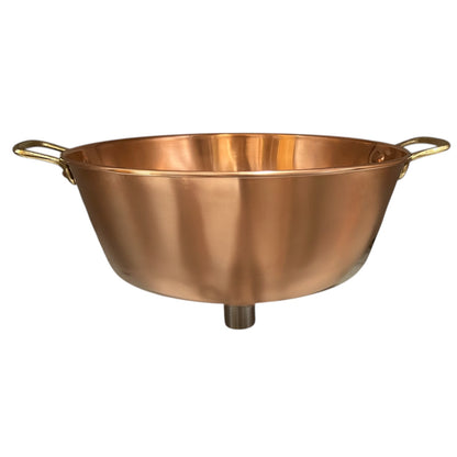 Copper sink with brass handles on a white background