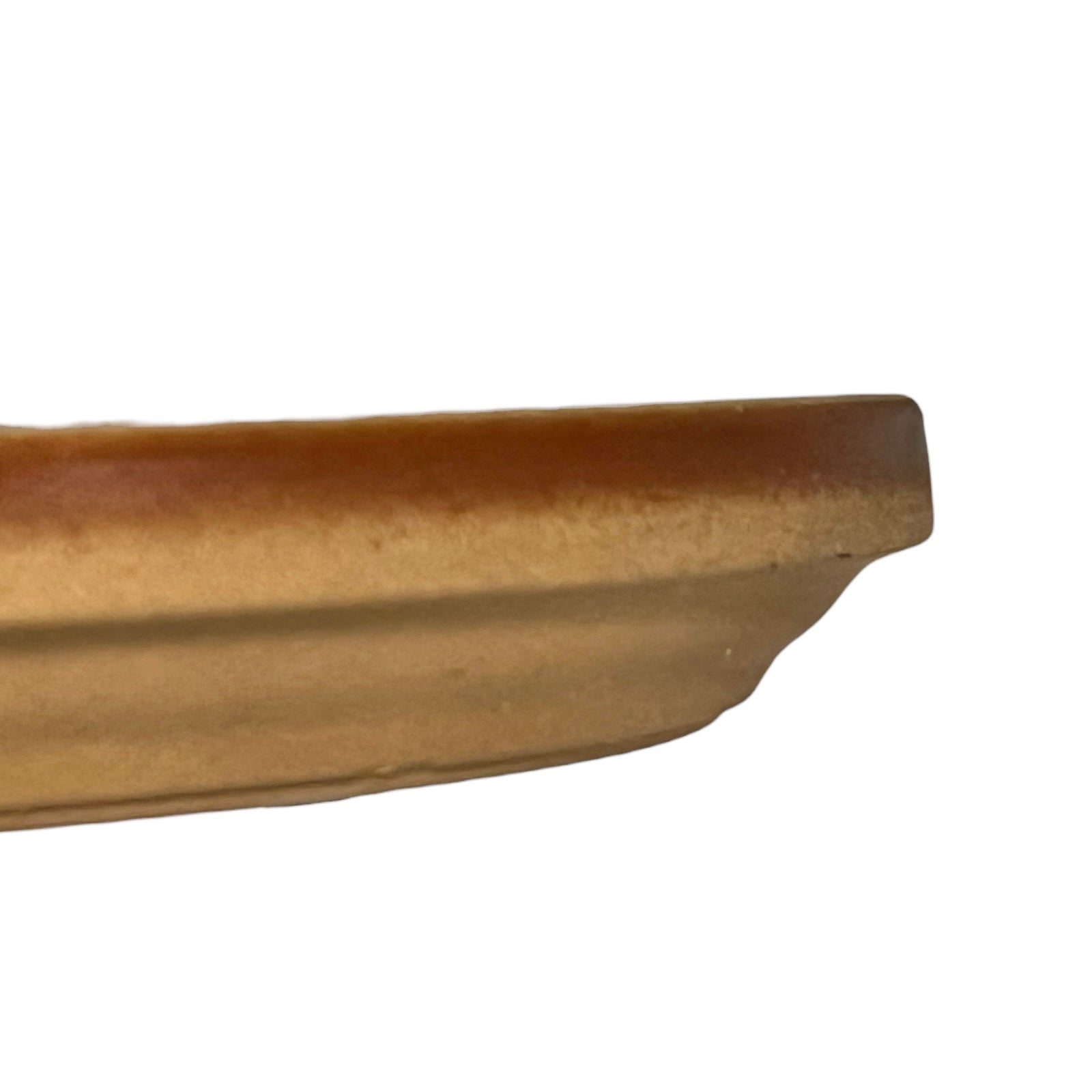 Edge of a plate on a white background