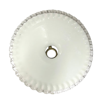 close up of inside of a white glass lampshade