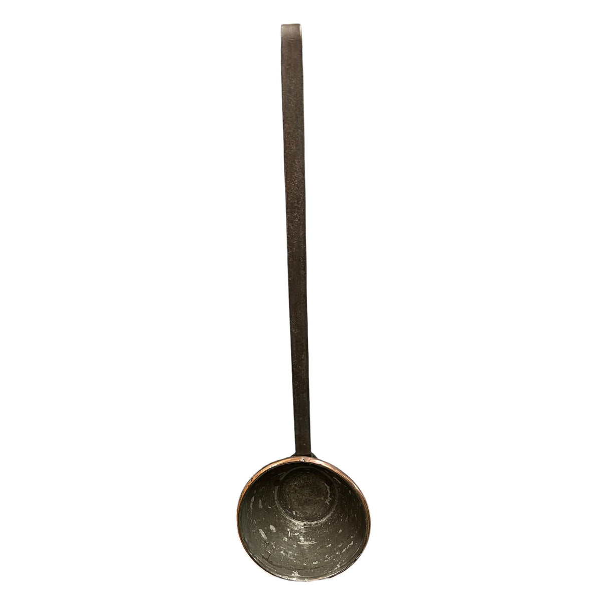 A rustic cast iron ladle with a long handle and a deep, textured bowl, shown vertically against a plain white background.
