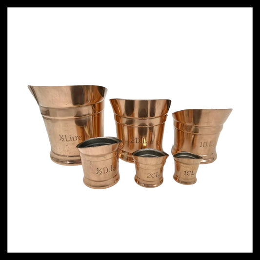 French vintage copper measuring jugs with tin lining for sale from All Things French Store