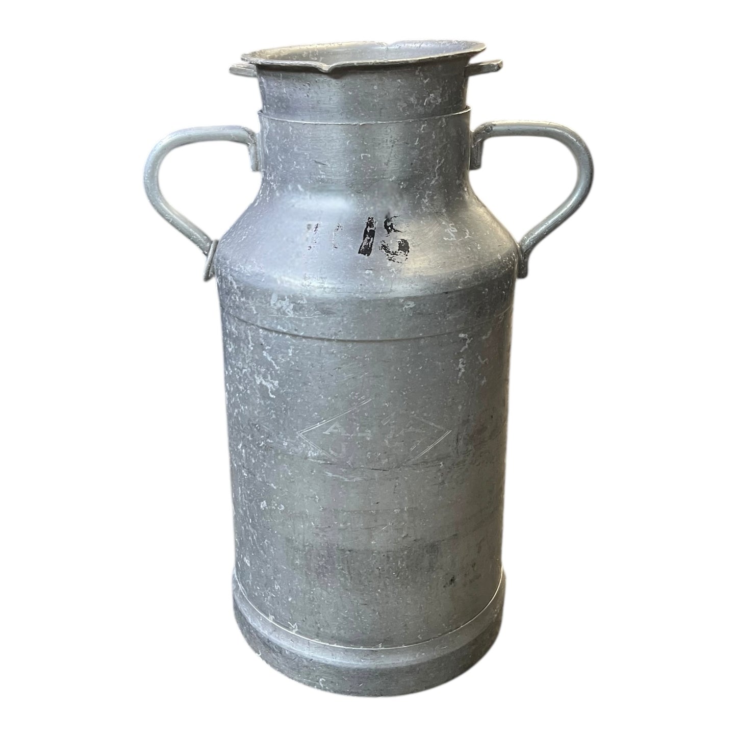 Metal milk churn on a white background