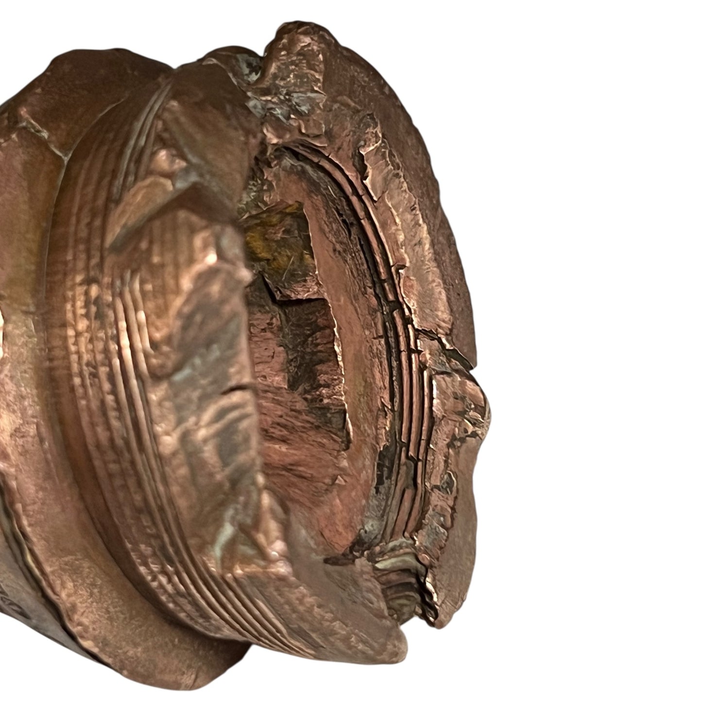 WW1 brass fuse paperweight on a white background 