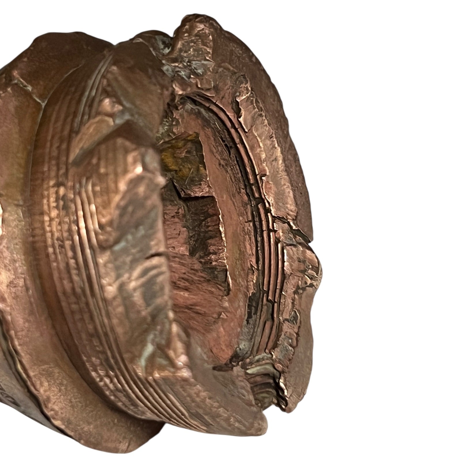 WW1 brass fuse paperweight on a white background 