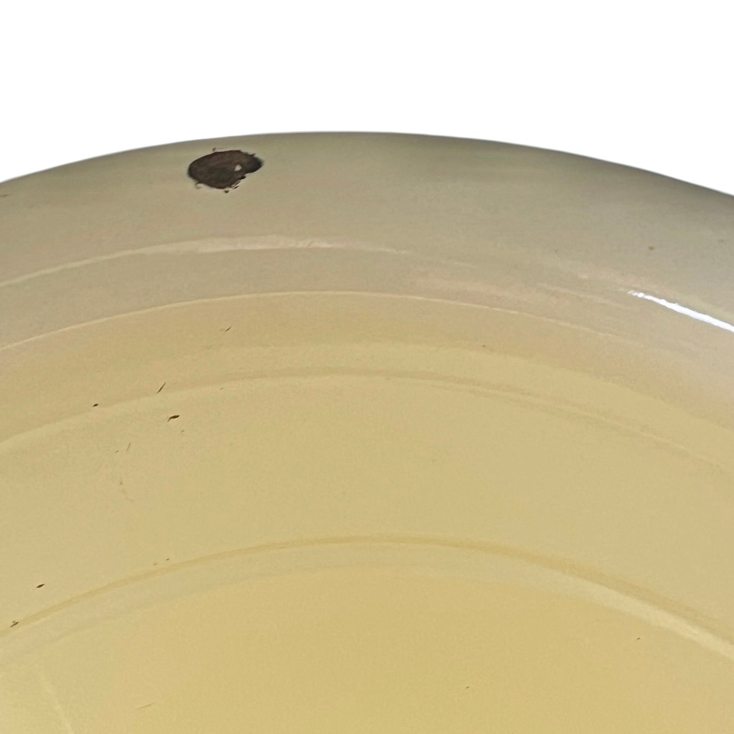 Close up of a French enamel bucket on a white background 