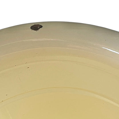 Close up of a French enamel bucket on a white background 