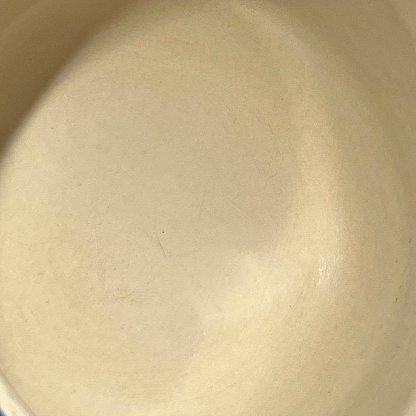 Close-up of a blue saucepan with a white background