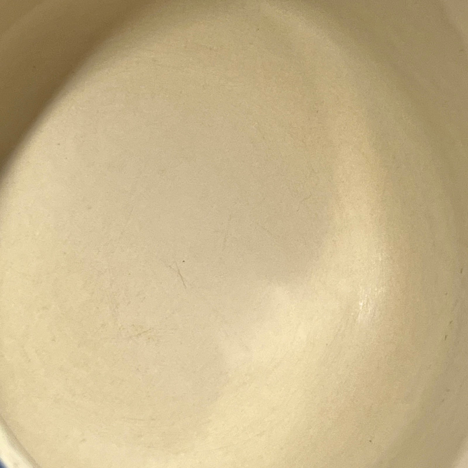 Close-up of a blue saucepan with a white background
