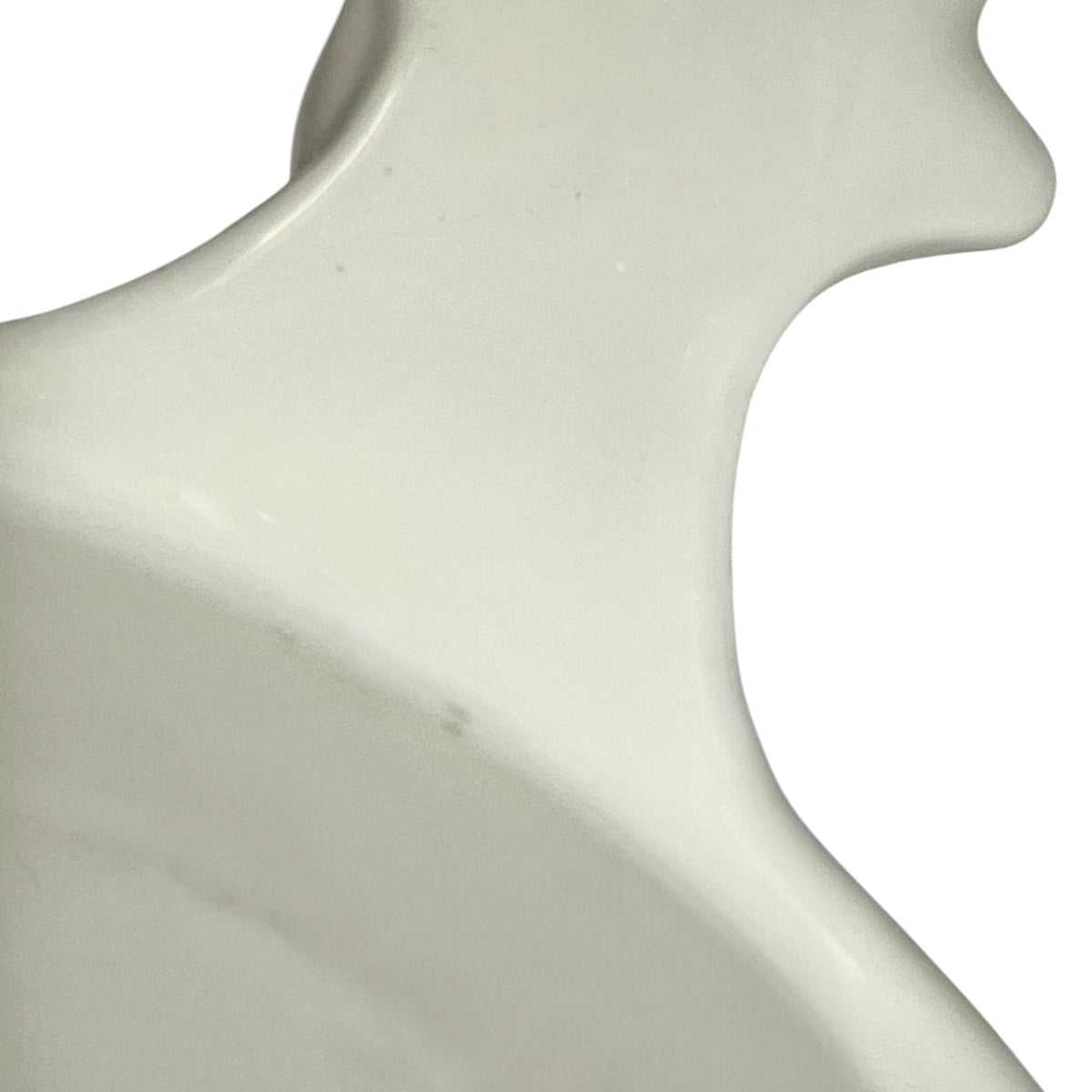 close up of a vintage French L'Hirondelle porcelain cheese dish with cow-shaped white base and illustrated Fromage lid, traditional French farmhouse cheese server.