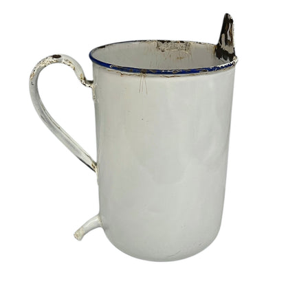 French vintage enamel irrigator in white with a blue trim in a well worn condition for sale 