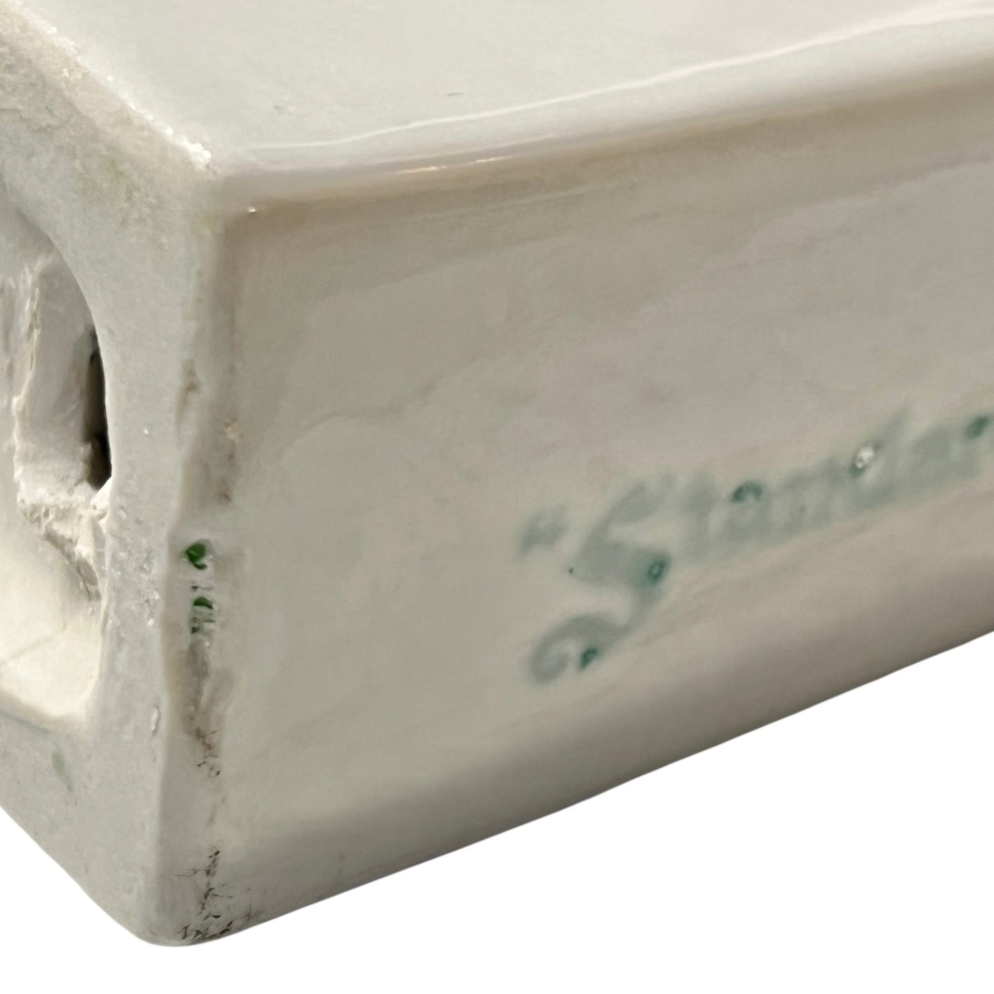 White ceramic shelf on a white background