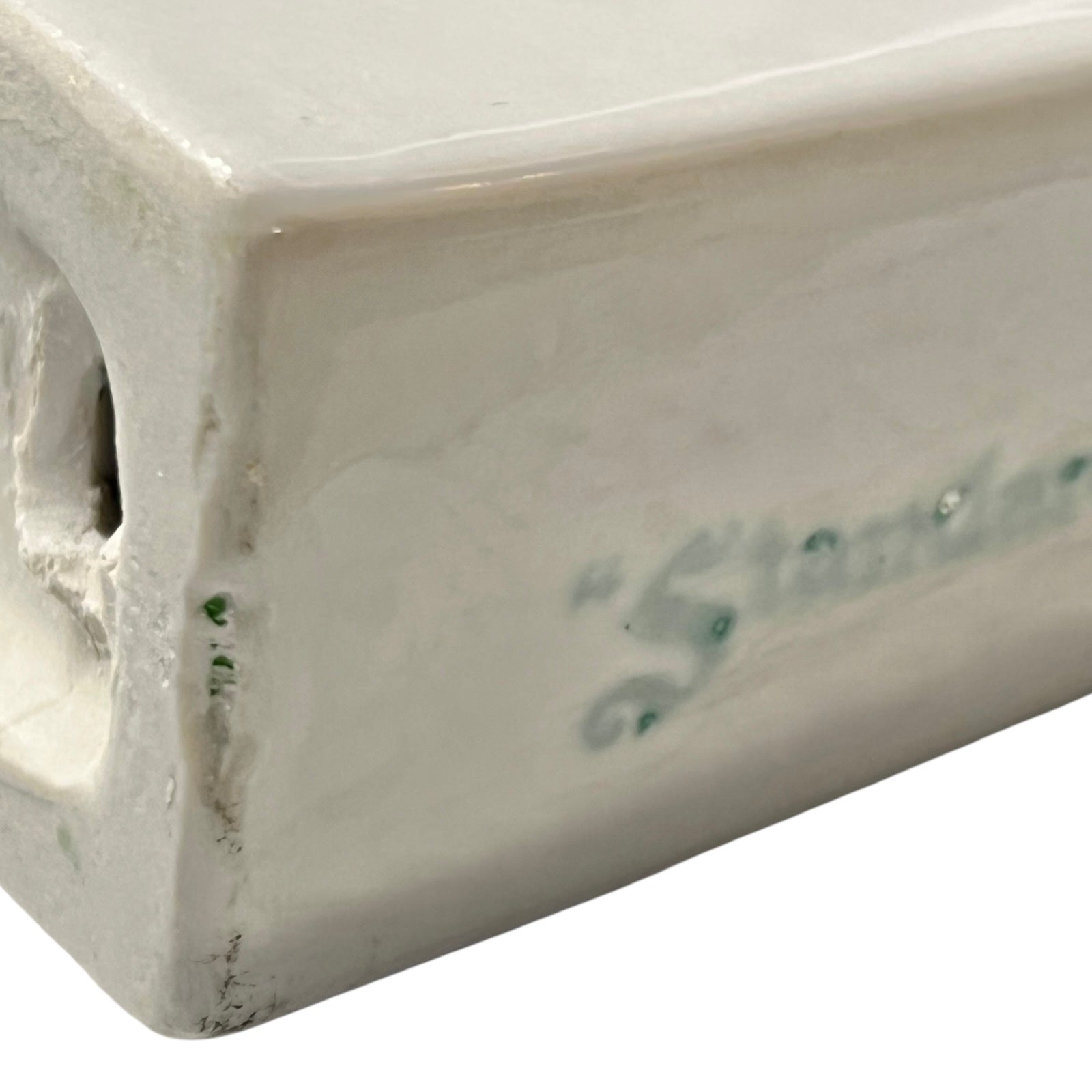 White ceramic shelf on a white background