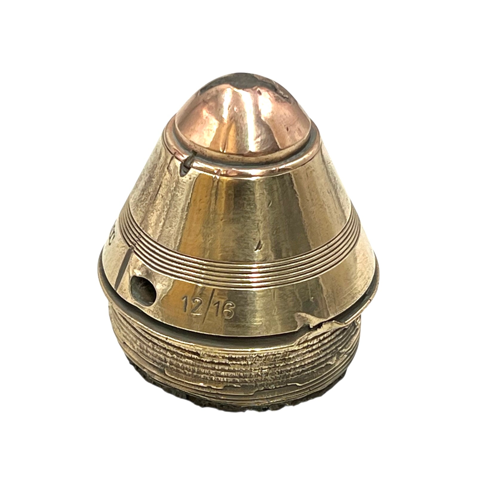 Polished British brass WW1 fuse or paperweight type 101 on a white background