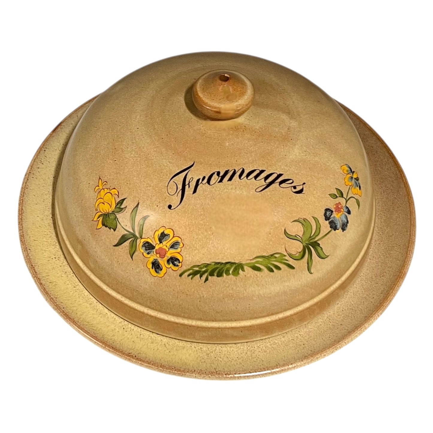 Round ceramic cheese dish with floral designs and 'Fromages' text on a white background