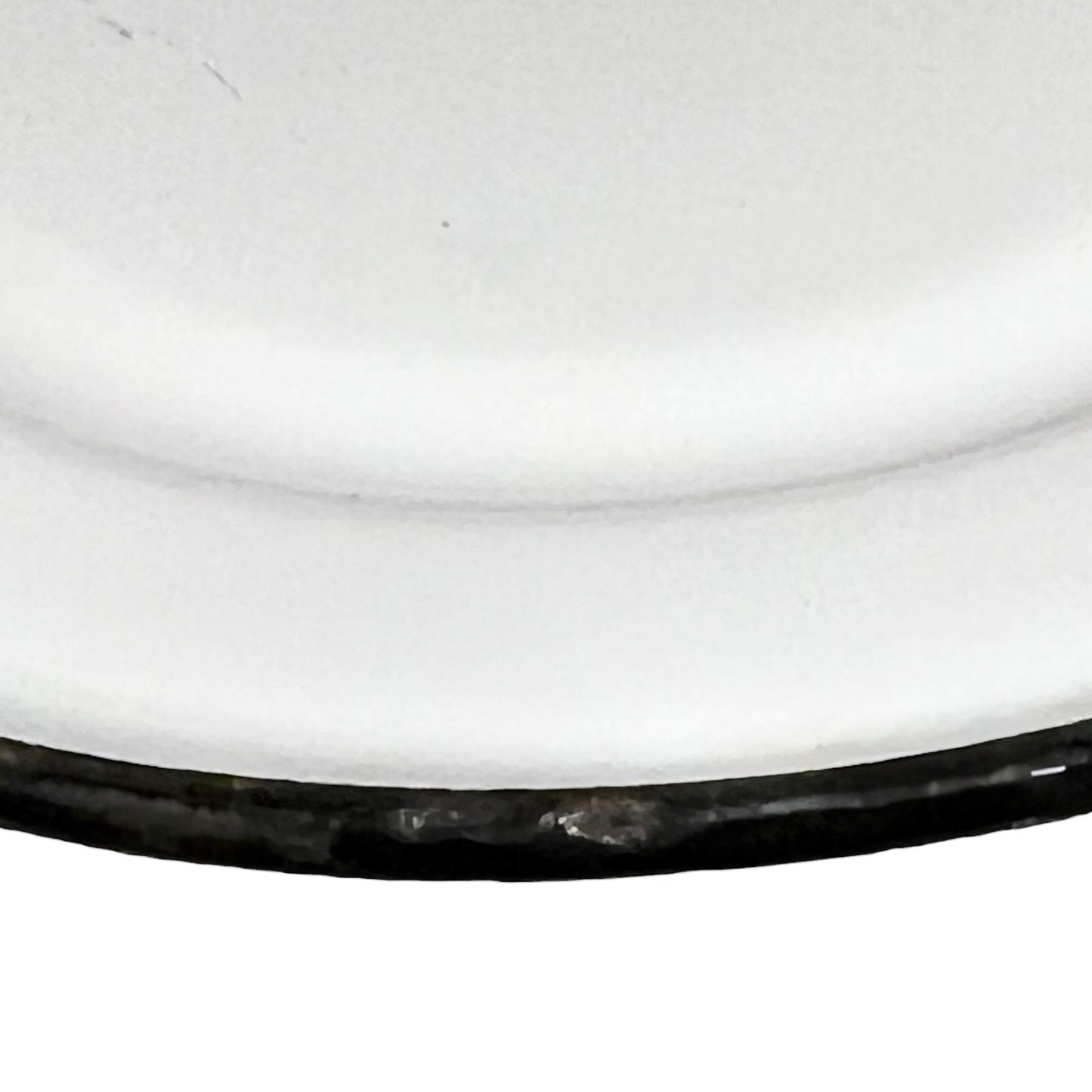 Close up of an enamel coffee pot on a white background
