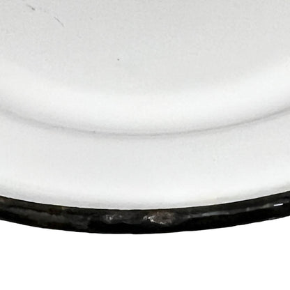 Close up of an enamel coffee pot on a white background