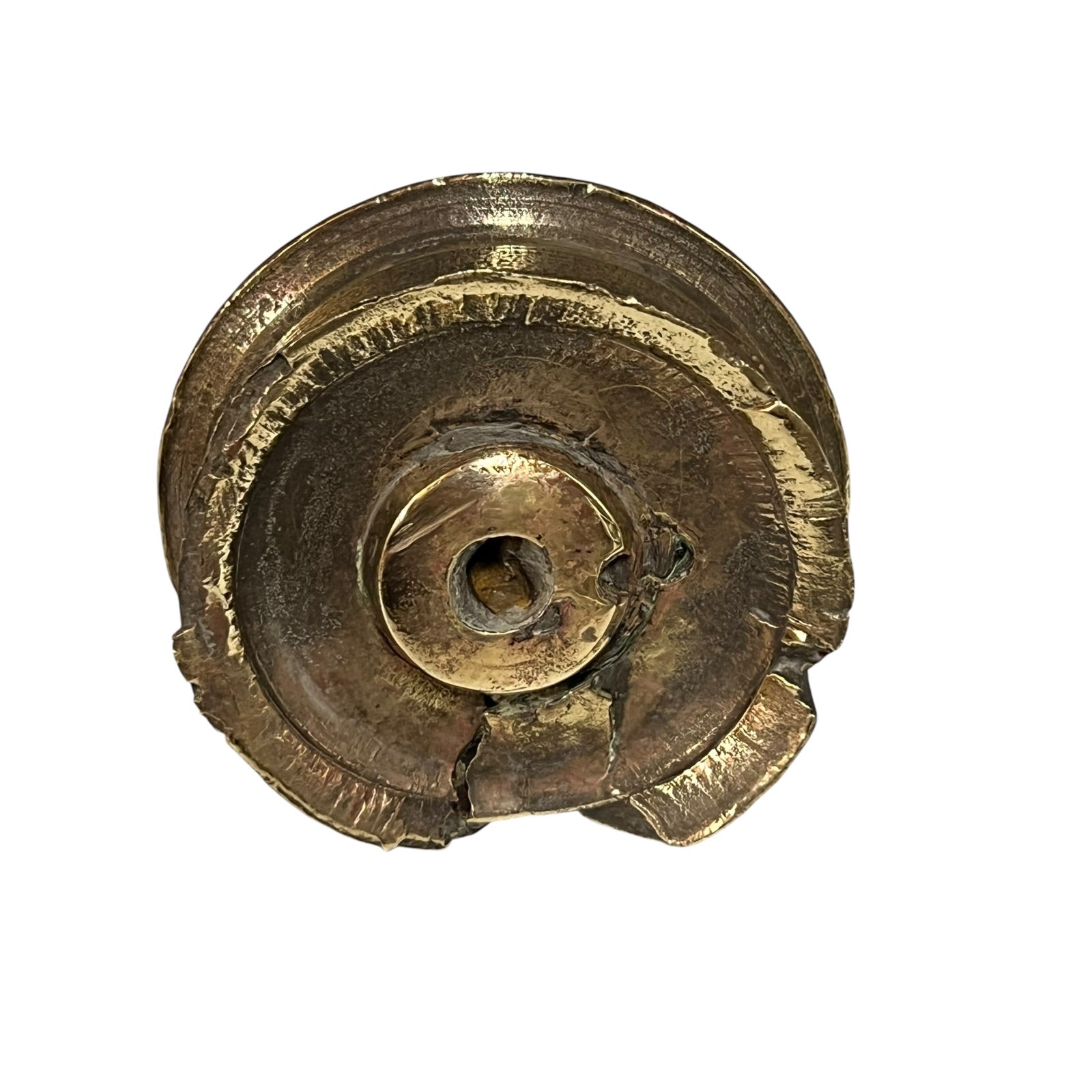 Close up of WW1 relic brass fuse on a white background