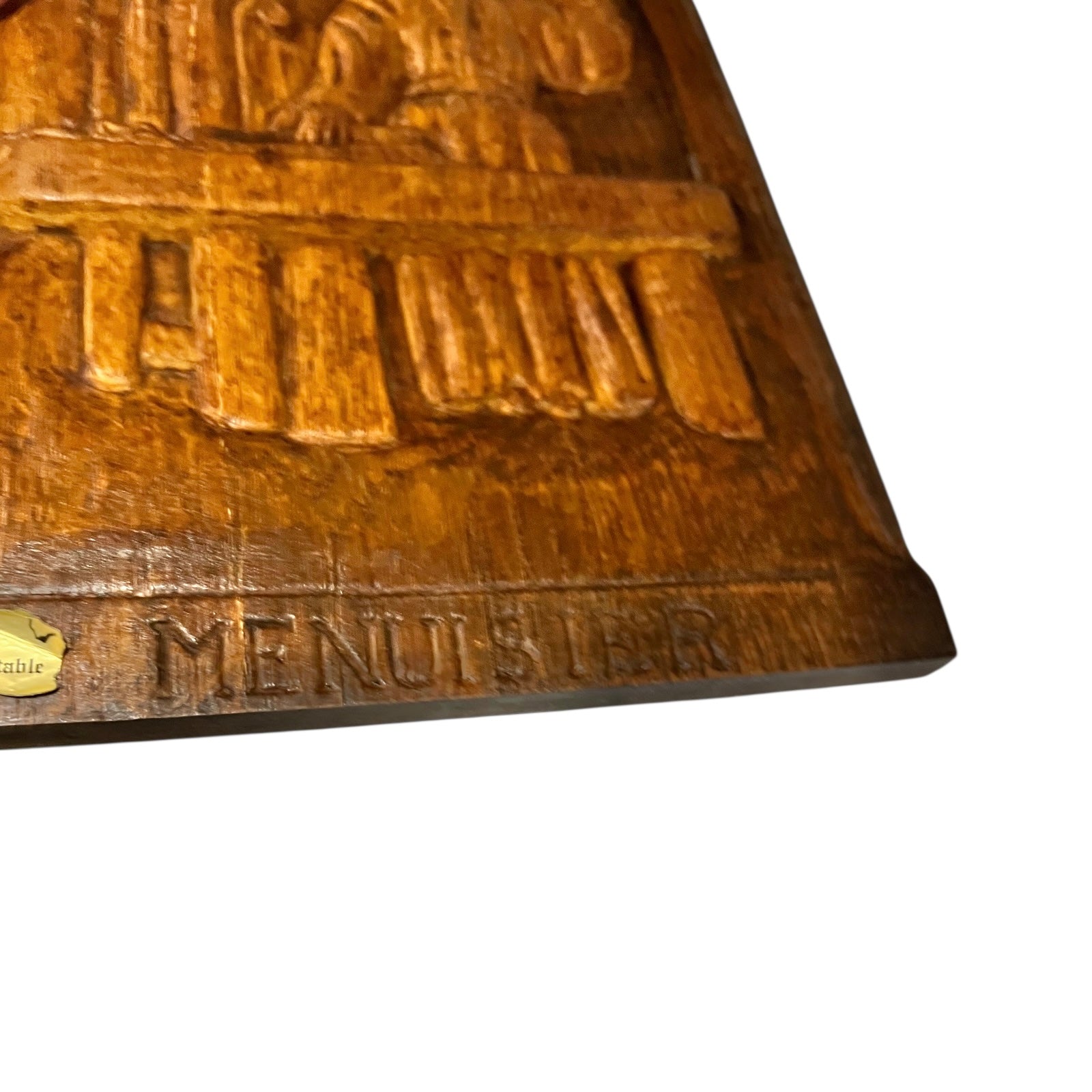 Wooden menu board with engraved design and 'Menuisiere' text on a white background