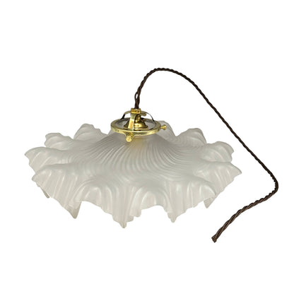 A French vintage Art Deco-style lampshade made of clear frosted glass with a frilled edge, with twisted-style wiring and brass fittings, perfect for adding charm to a period room or retro home, displayed against a white background.
