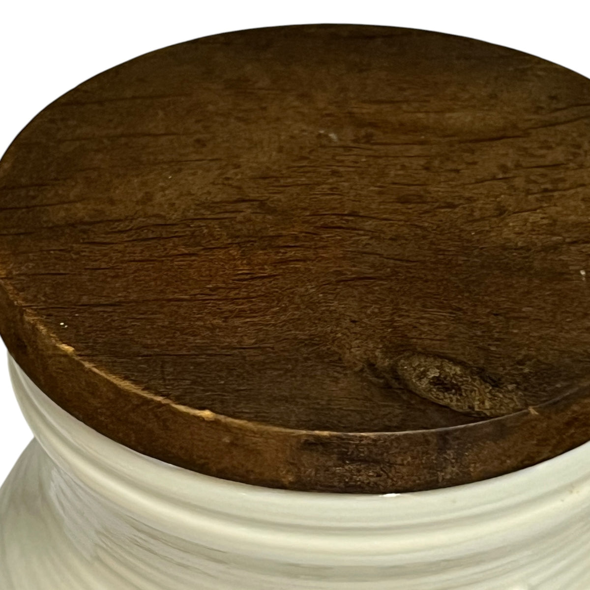 wooden lid of a ceramic table bin