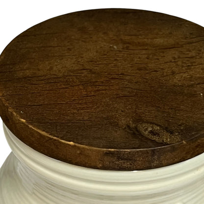 wooden lid of a ceramic table bin